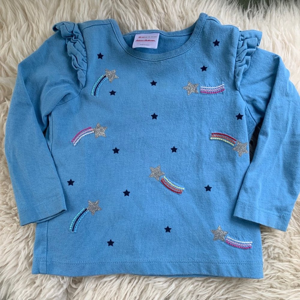 Hanna Andersson's long sleeve ruffle shoulder tops Shooting Stars 18-24 months